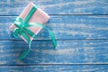 Gift boxes in paper on a blue wooden table Royalty Free Stock Photo