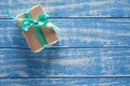 Gift boxes in paper on a blue wooden table Royalty Free Stock Photo