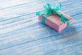 Gift boxes in paper on a blue wooden table Royalty Free Stock Photo