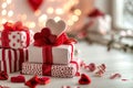 Gift boxes with red ribbons and decorations on Valentine`s Day, handmade heart shapes on bokeh lights background. Romantic home