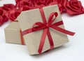 Gift boxes with red satin ribbons