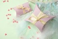 Gift boxes with ribbon on green pastel background with copy space. Minimal cincept of holiday. Top view, spring background. Royalty Free Stock Photo