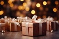 Gift boxes with ribbons on wooden table against defocused lights