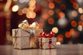 gift boxes on a table with a christmas tree in the background reklamnÃÂ­ fotografie Royalty Free Stock Photo