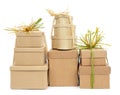 Gift boxes tied with natural raffia of different colors Royalty Free Stock Photo