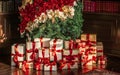 Gift boxes and traditional Christmas tree, wrapped presents and decor in colonial style as holiday home decoration