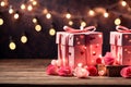 valentine gifts with lights around it and flowers on a table