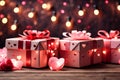 three valentine presents on a table with hearts in the background