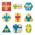 Gift boxes of various shapes and sizes with beautiful ribbons and bows, top view. Royalty Free Stock Photo