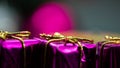 Gift boxes of violet color and golden ropes on a dark background Royalty Free Stock Photo