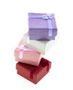 Gift boxes on white isolate purple, red and light green and pink