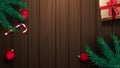 Gift, candy cane, Christmas tree branch, Christmas balls on wooden table. Background for your arts Royalty Free Stock Photo