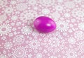 Painted in pink boiled egg on pink background for celebration of Easter, top view closeup postcard Royalty Free Stock Photo