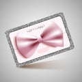 Gift card with bow and silver glitter Royalty Free Stock Photo