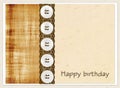 Gift card with color squares, buttons and brown lace and inscription Happy Birthday!