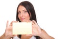 Gift card. Excited woman showing empty blank paper card sign Royalty Free Stock Photo