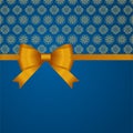 Gift Card With Gold Ribbon And A Bow on blue background. Gift Voucher Template with place for text. Royalty Free Stock Photo