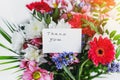 card thank you in a beautiful bouquet of flowers Royalty Free Stock Photo