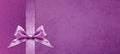 Gift cards with pink ribbon bow Isolated on pink and purple texture background, christmas and greeting template with copy space Royalty Free Stock Photo