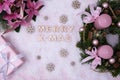 Gift, Christmas wreath, flowers, and the words Royalty Free Stock Photo