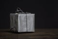 Gift closeup. Present for men on dark background, front view