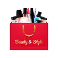 Gift cosmetics set in red paper bag. Royalty Free Stock Photo
