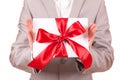 Gift with decorative red ribbon bow Royalty Free Stock Photo