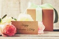 Gift and flowers. Royalty Free Stock Photo