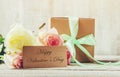 Gift and flowers. Royalty Free Stock Photo