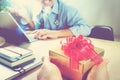 Gift Giving.Patient hand or Team giving a gift to a surprised Me Royalty Free Stock Photo