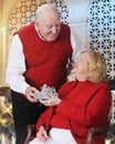 Gift Giving Senior Royalty Free Stock Photo
