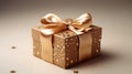 Gift in a gold box with a bow close-up. Gift box with a golden ribbon