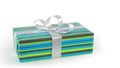 Gift with green and blue gift paper and silver ribbon