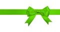 Gift green ribbon and bow isolated on white Royalty Free Stock Photo