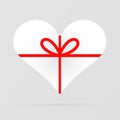 Gift Heart Icon. White gift box in the shape of a heart tied with red ribbons with a bow. Heart decoration. Love and celebration Royalty Free Stock Photo