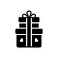 Black solid icon for Gift, offering and giftware Royalty Free Stock Photo