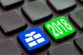2018 and a gift icon written on a computer keyboard Royalty Free Stock Photo