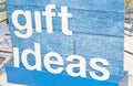 Gift ideas ; message on a blue board.