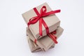 Gift kraft square box with a red ribbon