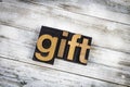 Gift Letterpress Word on Wooden Background Royalty Free Stock Photo