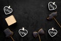 Gift for man on birthday. Gift box among cookies in shape of moustache, hat, bow tie and hearts with lettering love you Royalty Free Stock Photo