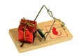 Gift on a mousetrap on a white background Royalty Free Stock Photo