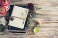 Gift, open notebook and flower decor Royalty Free Stock Photo