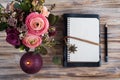 Gift, open notebook and flower decor Royalty Free Stock Photo