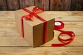 Gift parcel or mail box with ribbon red bow, brown carton parcel, surprise