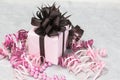 Gift pink box with bow and ribbons