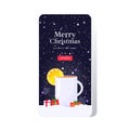 Gift present boxes near christmas drink mulled wine with orange slice winter holidays celebration concept smartphone