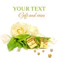 Gift, rose flowers and gold ribbon