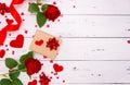 Gift, rose and red hearts on white wooden background, top view. Copyspace, a Valentine`s Day concept Royalty Free Stock Photo