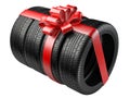 Gift set four tyres with a wrapped red ribbon and bow.